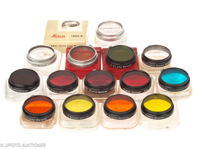 Lot with 13 Leitz 36mm clamp on filters