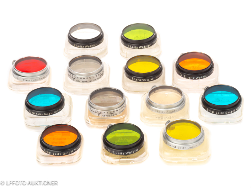 Lot with 13 Leitz 36mm clamp on filters