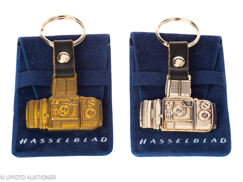 Lot with two Hasselblad 203FE key chains