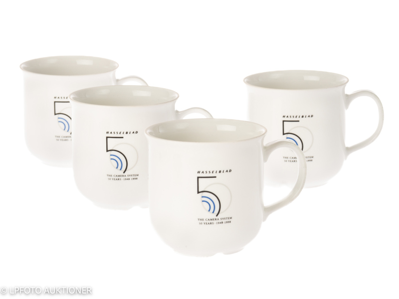 Lot with four commemorative Hasselblad cups