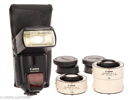 Lot with Canon Speedlite 580EX No.373568 and two extenders