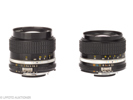 Lot with two Nikkor lenses