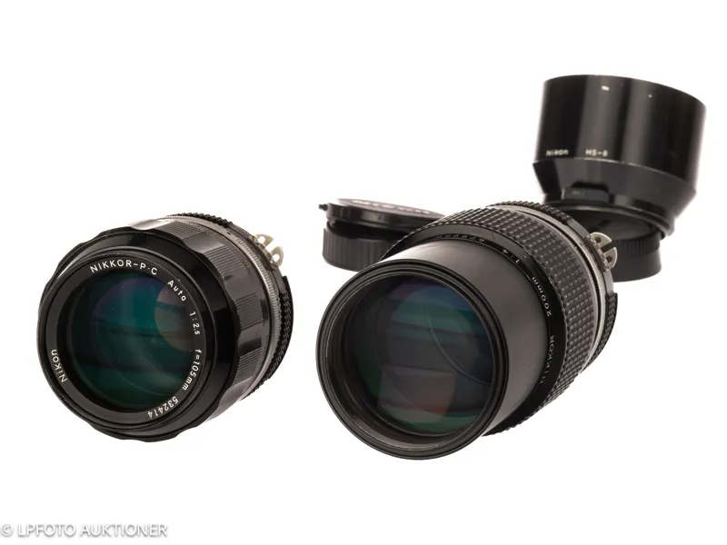 Lot with two Nikkor lenses